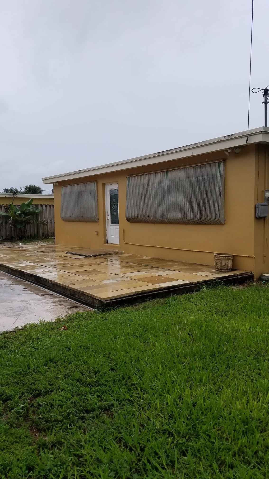 Existing patio area before roofing renovation
