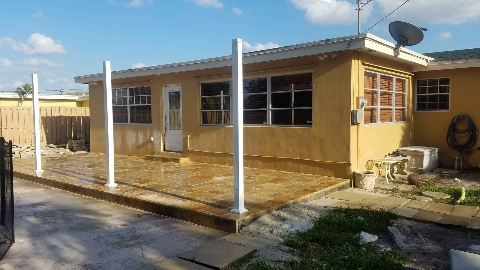 Patio roof posts and framing during renovation