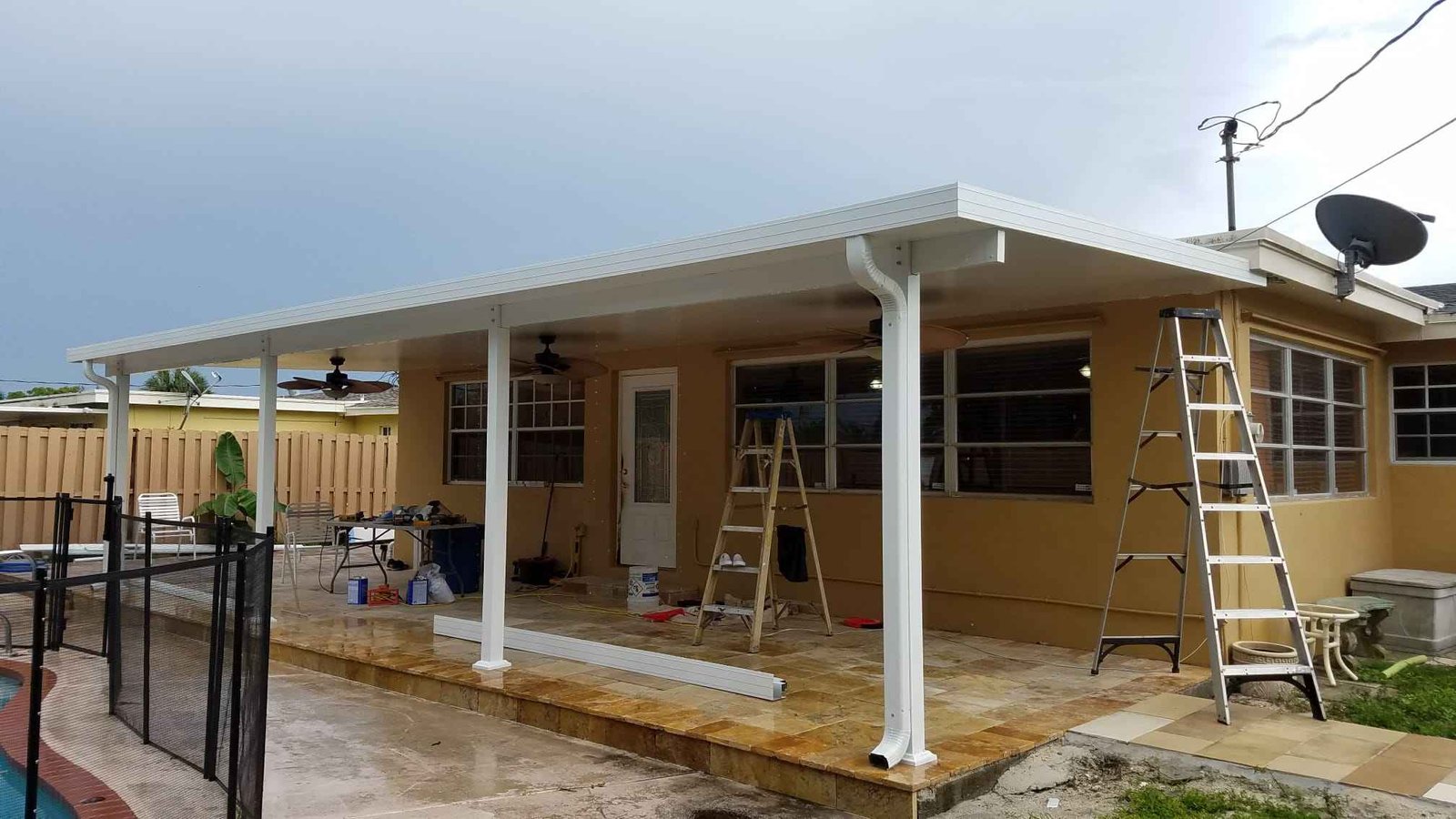New covered patio roof installation