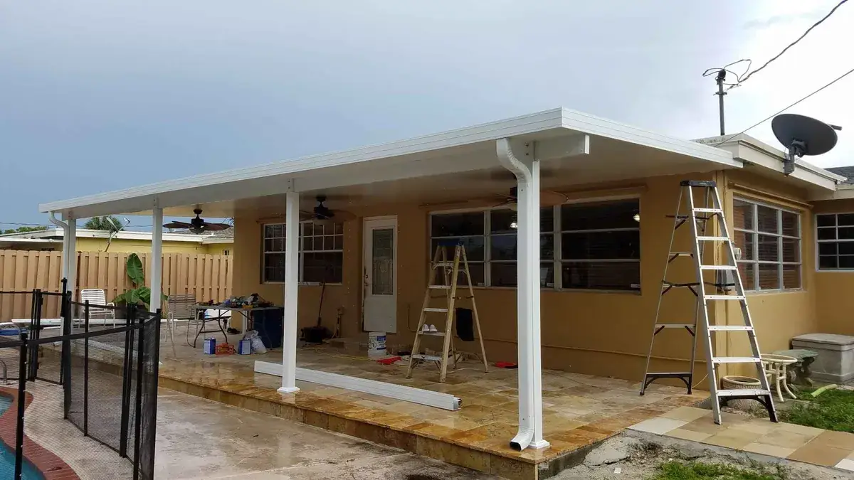 New covered patio roof installation